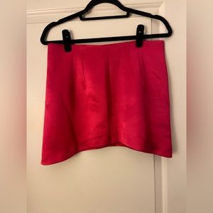 Hot Pink wavy hem mini skirt. Size L. Silky fabric